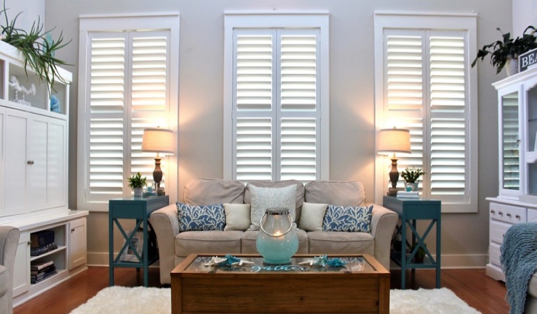 Indianapolis designer living room with chic shutters 